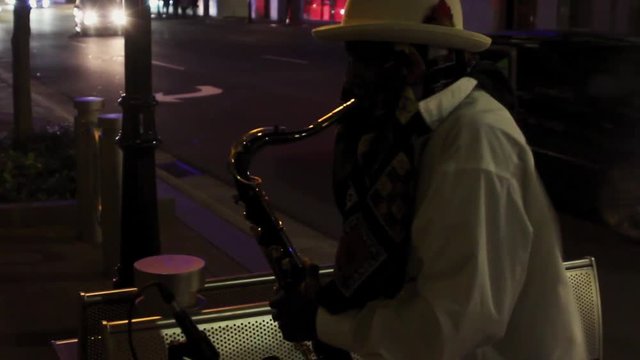 City Sax Musician At Night
