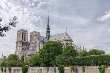 Fototapeta na wymiar Paris, Notre-Dame cathedral in the ile de la Cite, cloudy sky 