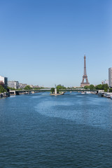 Fototapeta premium Paris, Eiffel tower, pont de Grenelle with Liberty statue on the Seine 