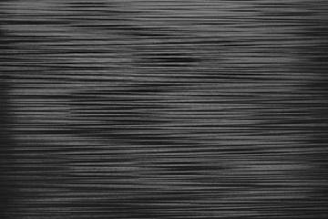 Irregular horizontal lines background. Black and white plastic texture closeup