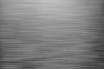 Irregular horizontal lines background. Grey plastic texture closeup