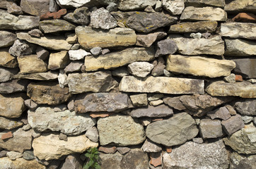 Old colorful stone wall closeup