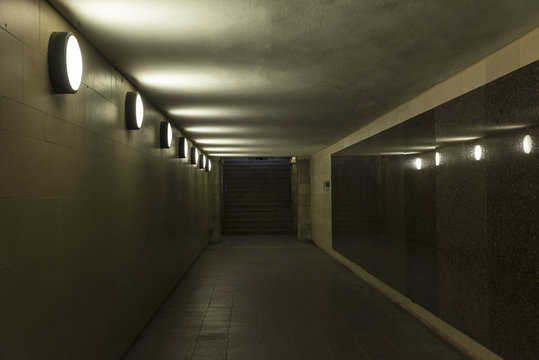 Tunnel illuminated for the passage of people