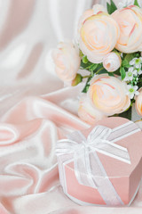 Obraz na płótnie Canvas Festive composition with camellias and gift box