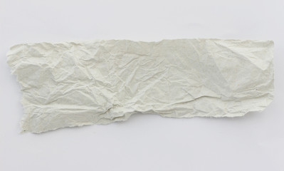 Fototapeta na wymiar torn of crumpled white paper texture on white