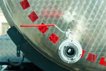 Cistern truck tank safety water valve. Close up. Selective focus.