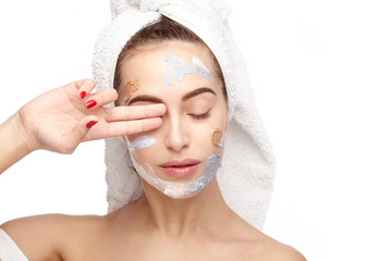 Woman posing with cleansing mask