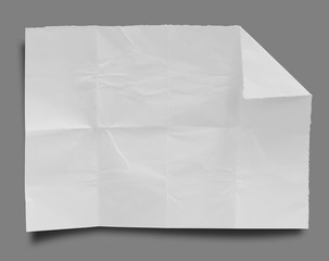Full page of White paper folded on gray background with shadow. this has clipping path.