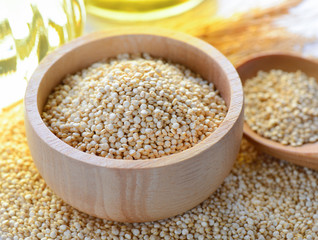 Quinoa in a wood spoon