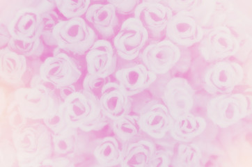 Blurred of sweet roses in pastel color style on soft blur bokeh texture for background