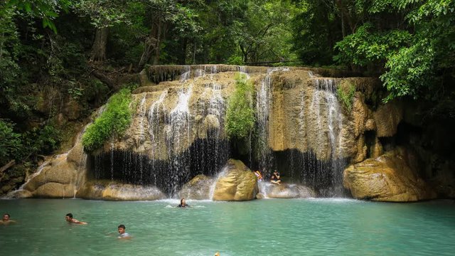 Time-lapse of People traveling and bath in Erawan waterfall, Thailand on June 24, 2017
