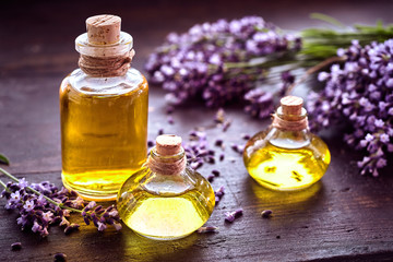 Obraz na płótnie Canvas Bottles of lavender essential oil or extract