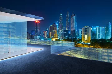 Foto op Aluminium Kuala Lumpur skyline at night with balcony view . © jamesteohart