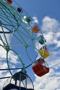 Ferris wheel in the summer Park.