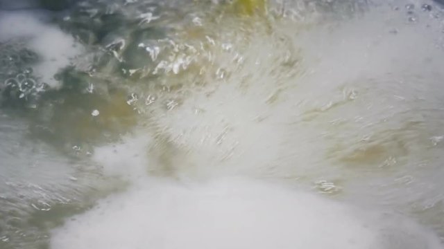 Boiling water with pasta.