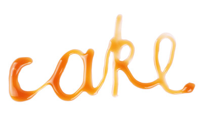 Word cake is written caramel on a white background