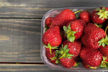 Strawberry. Wooden background. Summer fruit. Healthy food