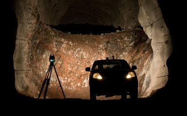 Total station for surveying with a car in illuminated mine. Iron ore industry, Kiruna, Sweden  autoautomobilkabinavagonvagónpilepracovitostpricinlivostprumyslprůmyslpílepřičinlivostnastrojnástrojprist