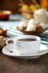 Fototapeta premium Hot chocolate on the Table with some Brazilian delicious. Festa Junina Theme