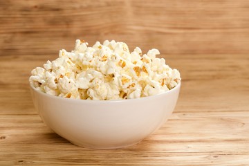 popcorn on wooden background