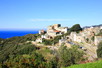 Fototapeta na wymiar Historic village on the coast of Corsica Island, France
