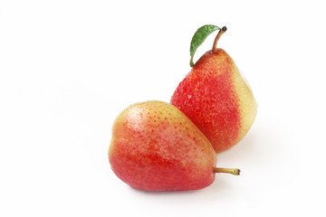 Two wet sweet ripe red pears