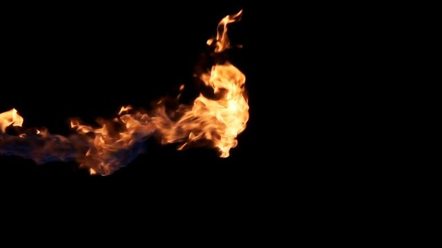 Tongue of flame coming in from left of frame slow motion