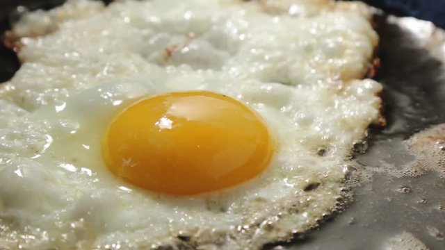 frying egg sunny side up