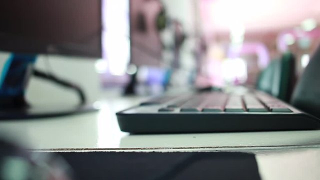 blurred of laptop keyboard computer in blur library Conner background