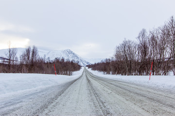 Obraz premium freeze road to tromso cover with snow in winter 