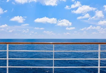 Zelfklevend Fotobehang Railing of cruise ship with ocean view. © Nancy Pauwels
