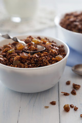 Bowl of granola with raisins and seeds