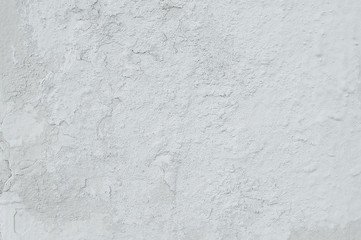 Old white cracked painted wall background texture