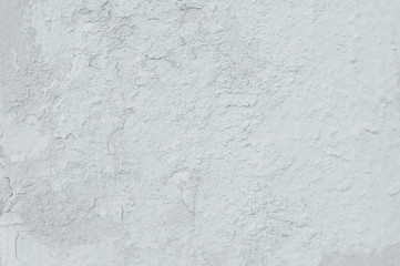 Old white cracked painted wall background texture