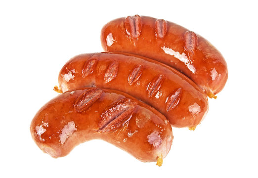 Three fried sausages on a white background