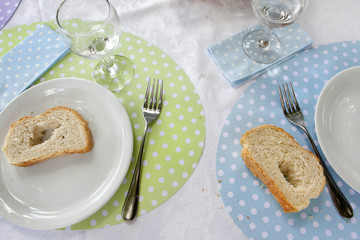 Decorated table served for baby's birthday/christening celebration