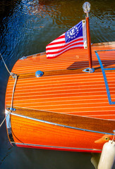 Barrel Back Mahogany Runabout and Ensign - Starboard Qtr