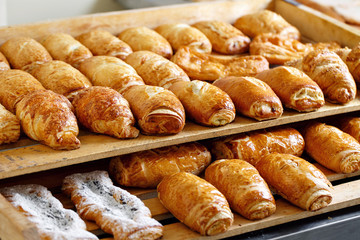 Puff pastry on wooden board. morning at the bakery