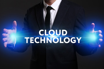 Business, Technology, Internet and network concept. Young businessman working on a virtual screen of the future and sees the inscription: Cloud technology