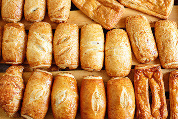 Puff pastry on wooden board. morning at the bakery