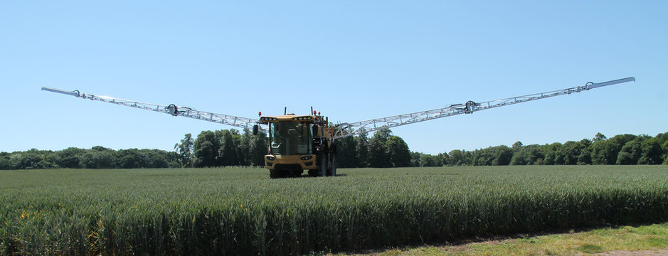 A Large Agricultural Farm Crop Spraying Vehicle.