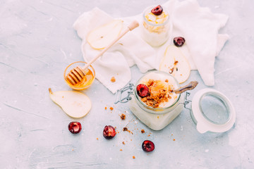 Fototapeta na wymiar Fresh Homemadee yogurt with honey and fruits