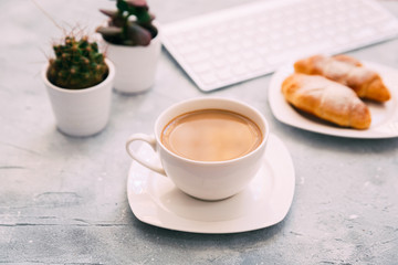 Morning Coffee mug with croissant  and keyboard