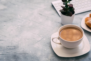 Morning Coffee mug with croissant  and keyboard