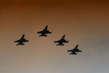 Naklejka na ściany i meble military jets flying in the sky 