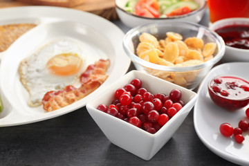 Delicious served breakfast on table