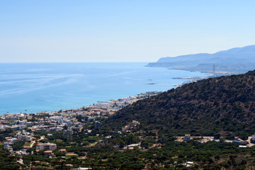 Fototapeta na wymiar View from the mountains down to bay of Malia, Crete (Greece)