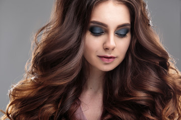 Fototapeta premium closeup beauty portrait of young woman with natural makeup and hairstyle. spa and care.