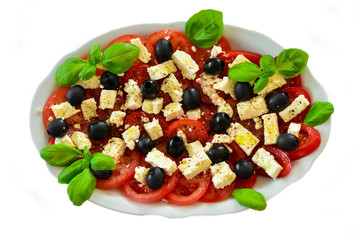 Tomaten mit Fetakäse, Oliben und Basilikum