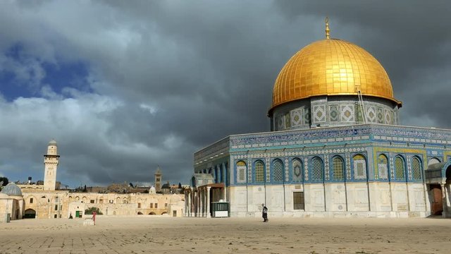 Clouds over Dome of the Rock in Jerusalem over the Temple Mount. Golden Dome is the most known mosque and landmark in Jerusalem and sacred place for all muslims.
